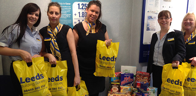 Members of staff from the Doncaster branch helping helping their local Food Bank